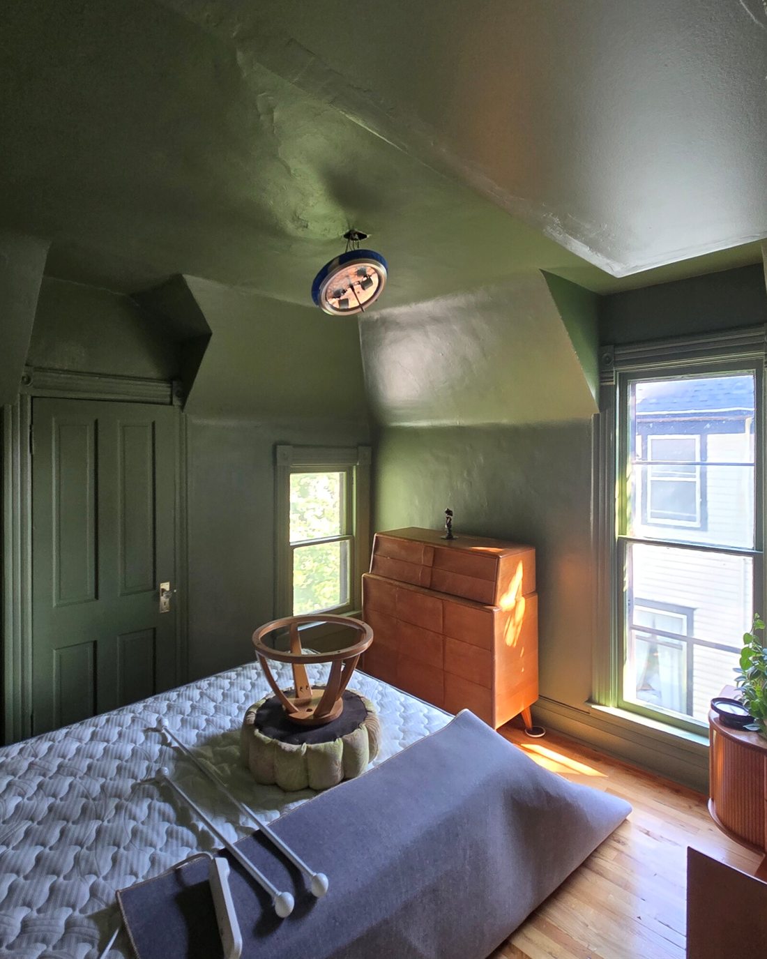 Bedroom painted deep olive green — walls, ceiling, trim and door - Topeka KS
